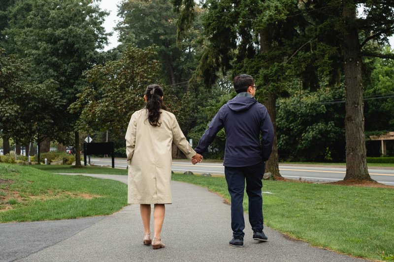 holding-hands-on-a-fall-walk